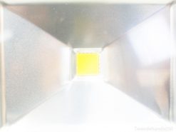 Sleek metallic funnel with a vibrant yellow square for a striking modern design.