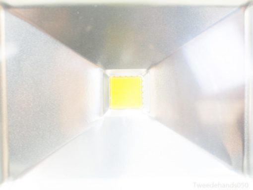 Sleek metallic funnel with a vibrant yellow square for a striking modern design.