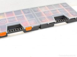 Clear tool organizers with orange clips for efficient storage and easy access to components.