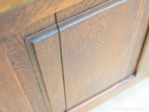 Timeless oak cabinet featuring rich grain and exceptional craftsmanship for elegant home decor.