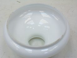 Sleek white porcelain bowl for stylish decoration and versatile usage in modern homes.