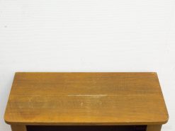 Warm vintage wooden table with rounded edges, ideal for cozy and versatile home interiors.