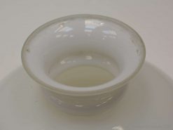 Elegant white ceramic bowl with a glossy finish, ideal for serving or decor.