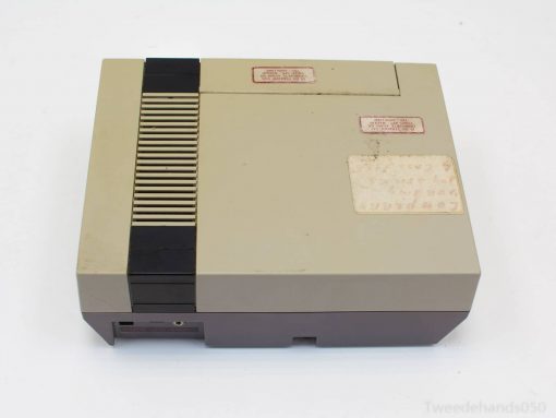 Vintage 90s Nintendo console, a nostalgic gem for retro gaming collectors and enthusiasts.
