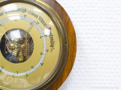 Antique wooden barometer, elegant design for stylish decor and accurate weather prediction.