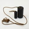 Cylindrical weights with string for balance and coordination training in fitness routines.
