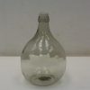 Elegant vintage glass bottle with a timeless design, ideal for storage and decorative accents.