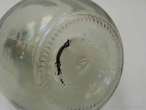 Elegant 500 ml vintage glass jar with embossed design, perfect for storage and décor.