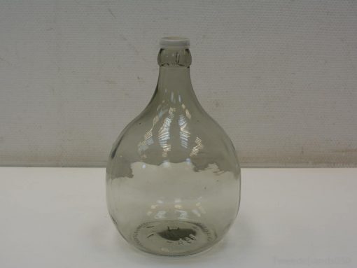 Elegant vintage glass bottle with a timeless design, ideal for storage and decorative accents.