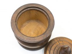 Elegant wooden storage jar with a lid, perfect for decor and organizational purposes.