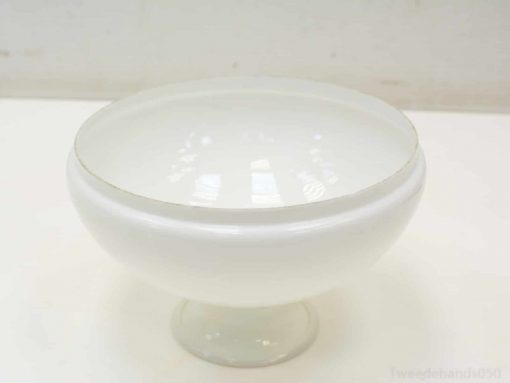 Sleek white glass pedestal bowl for modern decor and elegant serving ideas.