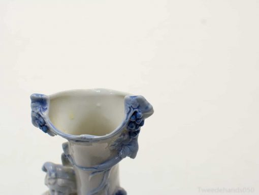 Elegant ceramic vase with intricate blue floral designs, ideal for timeless home decor.