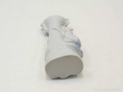 Sleek white porcelain decoration with subtle blue accents, ideal for modern decor and collectors.