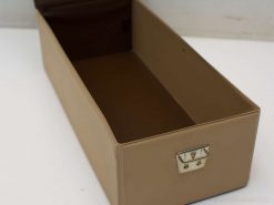 Stylish tan storage box with metal latch for versatile organization in any setting.