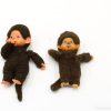 Charming vintage Monchhichi monkey dolls, perfect for collectors and nostalgic decor.