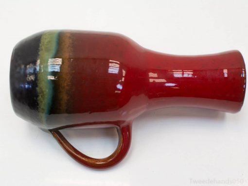 Elegant red ceramic vase with colorful gradient, perfect for stylish home decor and artistic display.