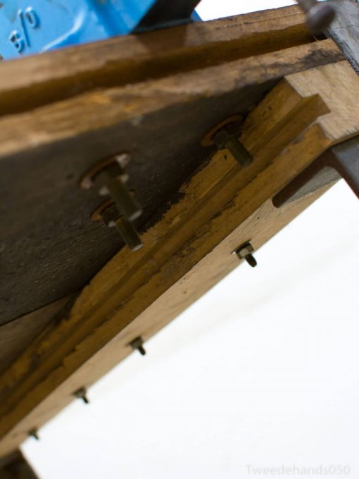 Wood and metal assembly exemplifying craftsmanship, durability, and precision in functional tool design.