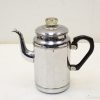 Elegant vintage stainless steel teapot with a black handle, perfect for tea enthusiasts.