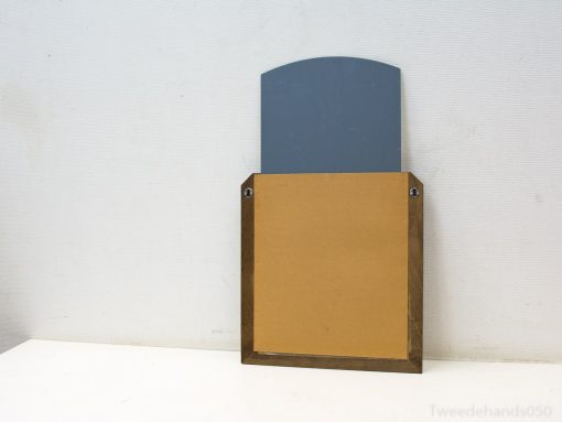 Stylish blue wall decoration with golden accents for modern homes and creative spaces.
