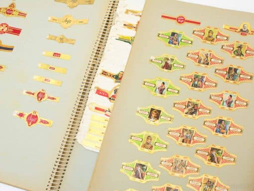 Vibrant vintage cigar bands showcasing artistic designs and rich cultural history in an album.