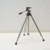 Sturdy, lightweight tripod with adjustable height and quick-release plate for stable photography.