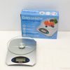 Modern kitchen scale with glass platform for accurate measurements up to 5 kg.