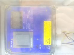 Advanced blue digital control panel with LED display for efficient industrial automation and monitoring.