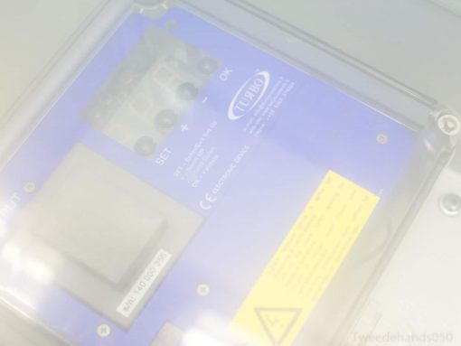 Advanced blue control panel with intuitive buttons and protective cover for technical applications.