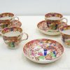 Vibrant vintage tea set with floral patterns, ideal for stylish gatherings and afternoon tea.