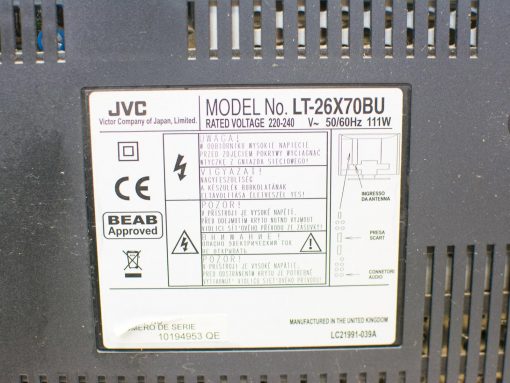 JVC LT-26X70BU TV label with power specs, safety symbols, and UK manufacturing details.