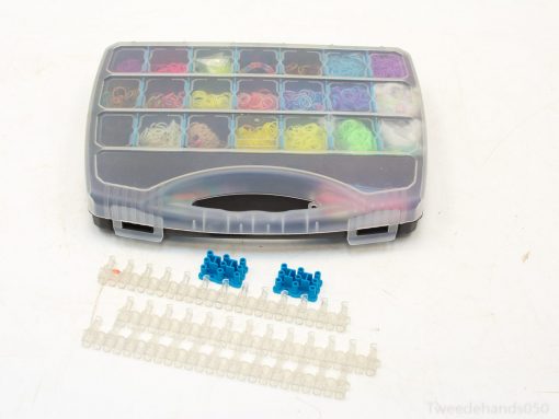 Colorful loom bands and tools for creative bracelet-making and DIY crafts.
