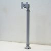 Sleek gray monitor mount with adjustable bracket for optimal stability and space-saving functionality.