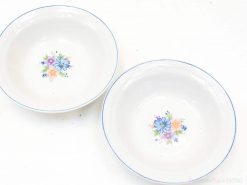 Charming floral porcelain bowls set of two for elegant dining and decorative use.