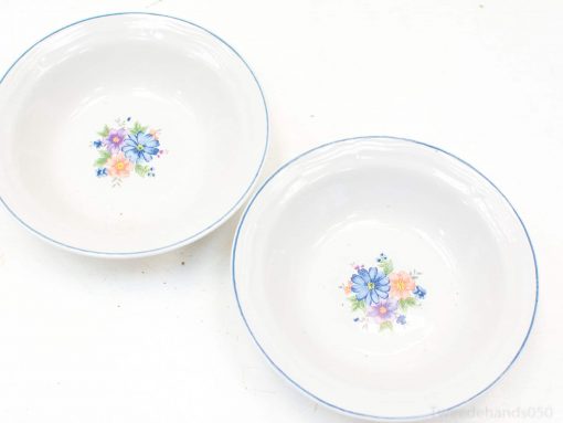Charming floral porcelain bowls set of two for elegant dining and decorative use.