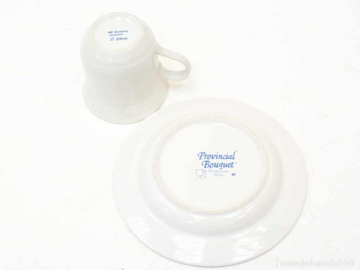 Elegant porcelain cup and saucer set, perfect for tea time and collectors.