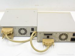 Vintage 90s computer peripherals with distinct ports, ideal for retro tech collectors and enthusiasts.