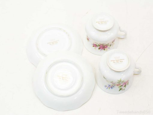 Elegant vintage floral china cups and saucers, perfect for collectors and special occasions.