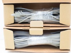 Organized gray cables in light brown boxes for efficient storage and easy access.