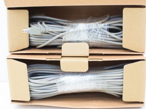 Organized gray cables in light brown boxes for efficient storage and easy access.