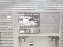 Sony KDL-26U3000 LCD TV back panel with electrical specs and multilingual safety warnings.