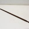 Antique wooden staff with carved handle, perfect for decoration or ceremonial displays.
