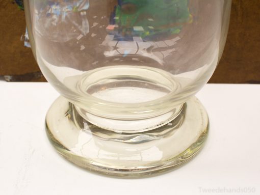 Elegant glass cloche with a sturdy base, perfect for stylish decor and versatile displays.