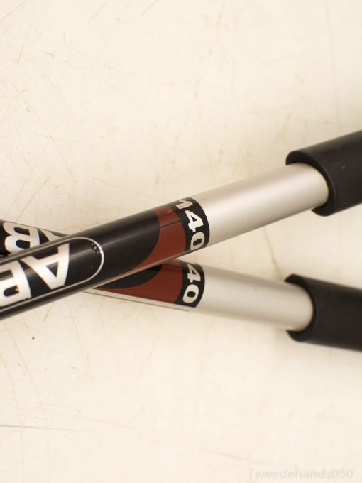 Lightweight aluminum trekking poles with ergonomic grips for comfort and stability on outdoor adventures.