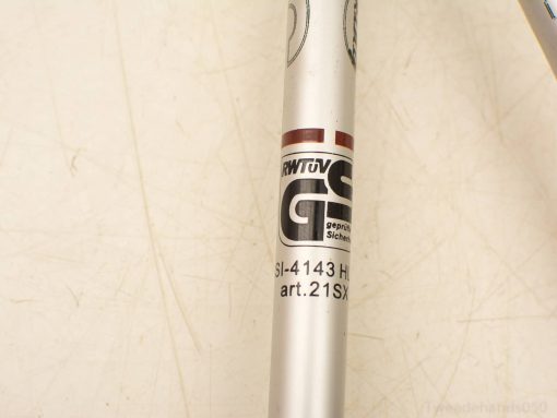 Premium Nordic walking pole with a shiny metallic finish and GS-certified safety standards.