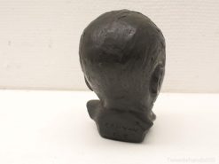 Handcrafted vintage head sculpture with unique hairstyle, ideal for collectors and art enthusiasts.