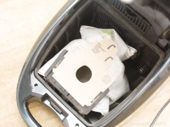 Sleek Montiss vacuum with eco-friendly dust bag for efficient cleaning and easy disposal.