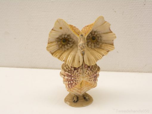 Charming seashell owl figurine, a creative vintage decor piece for nature enthusiasts.