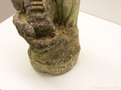 Weathered hand sculpture in earthy tones, symbolizing growth, support, and artistic resilience.