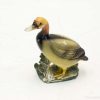 Elegant bone china duck figurine with vibrant colors and realistic details for collectors and decor.