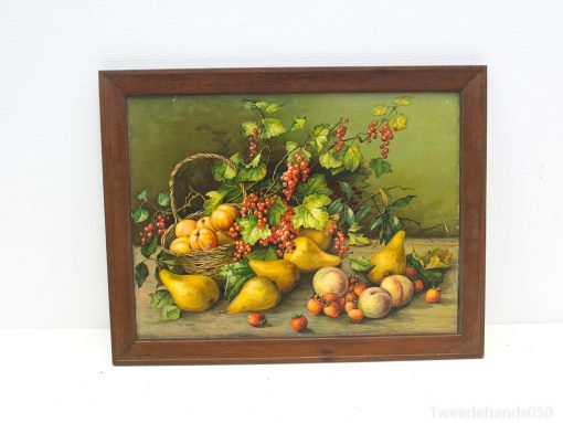 Vibrant still life of assorted fruits in a basket, showcasing natures bountiful harvest.